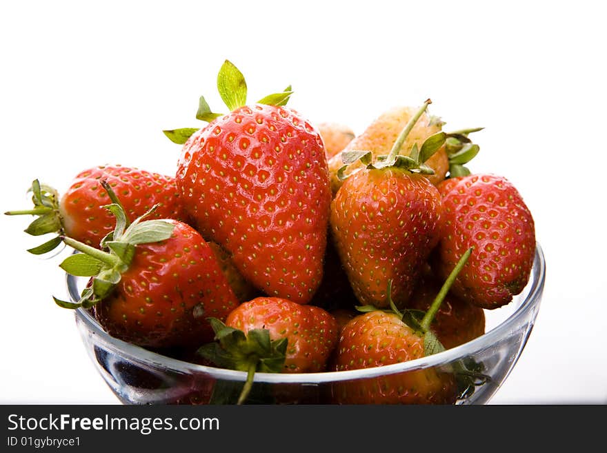 Strawberry in plate on white background