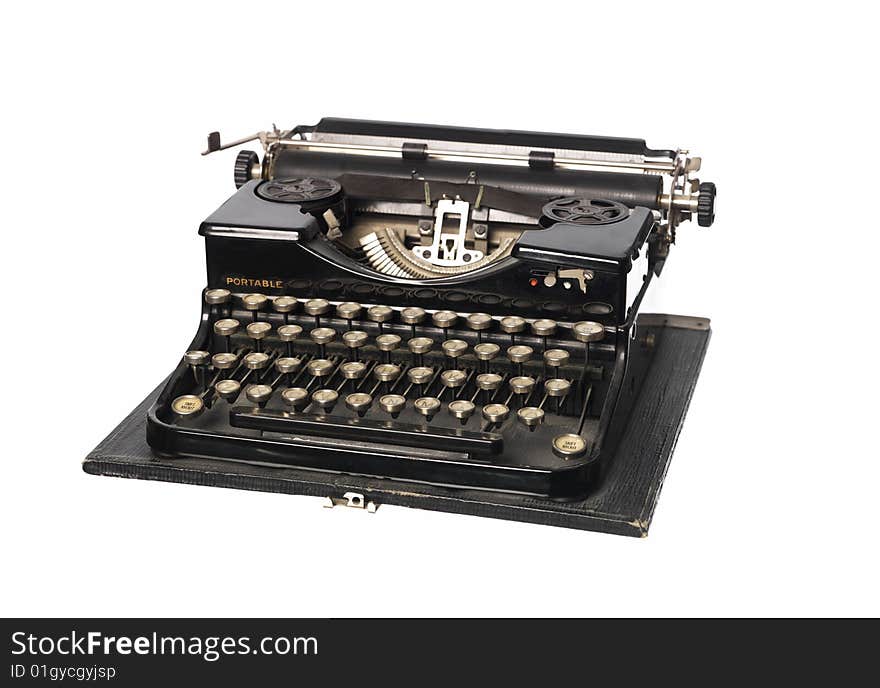 Vintage typewriter towards white background