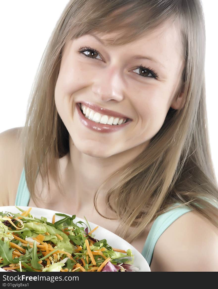 Woman eating salad