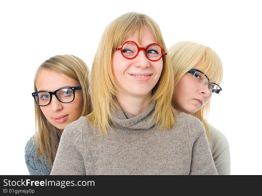 Three attractive girls isolated on a white background