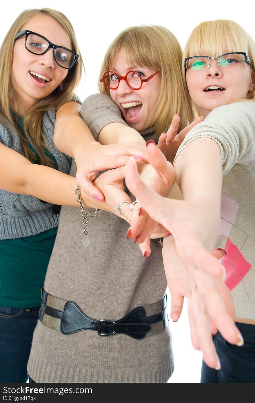 Three attractive girls isolated on a white background