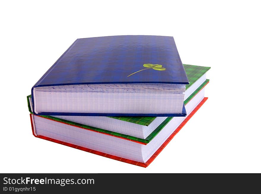 Three exercise books isolated on white