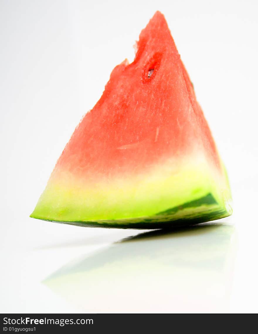 Juicy watermelon on a white surface