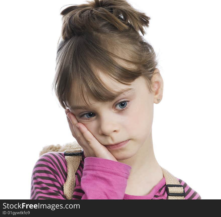 Small caucasion girl with sad expression on her face. Small caucasion girl with sad expression on her face