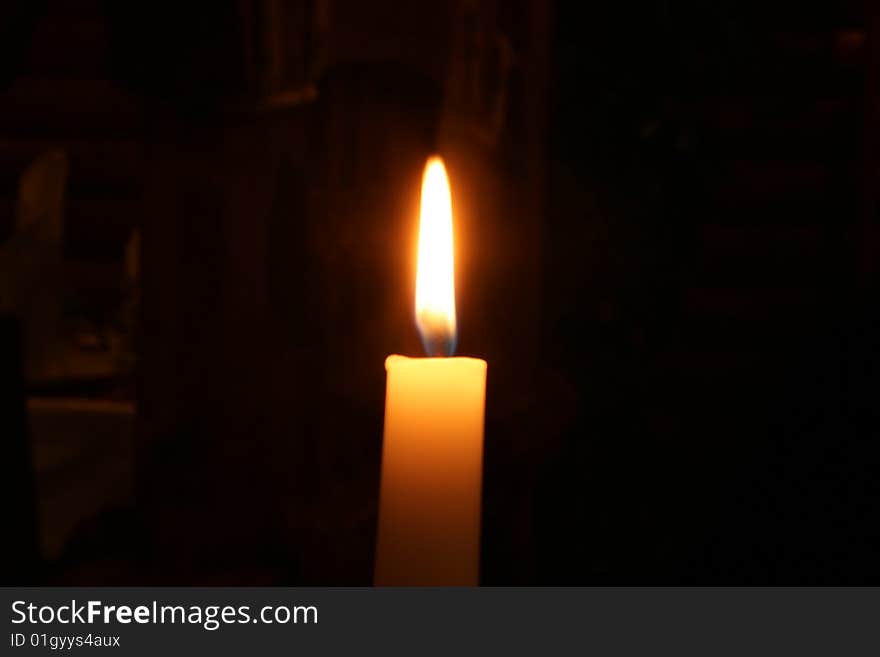 Candle photo at weak illumination indoors with foreground allocation. Candle photo at weak illumination indoors with foreground allocation