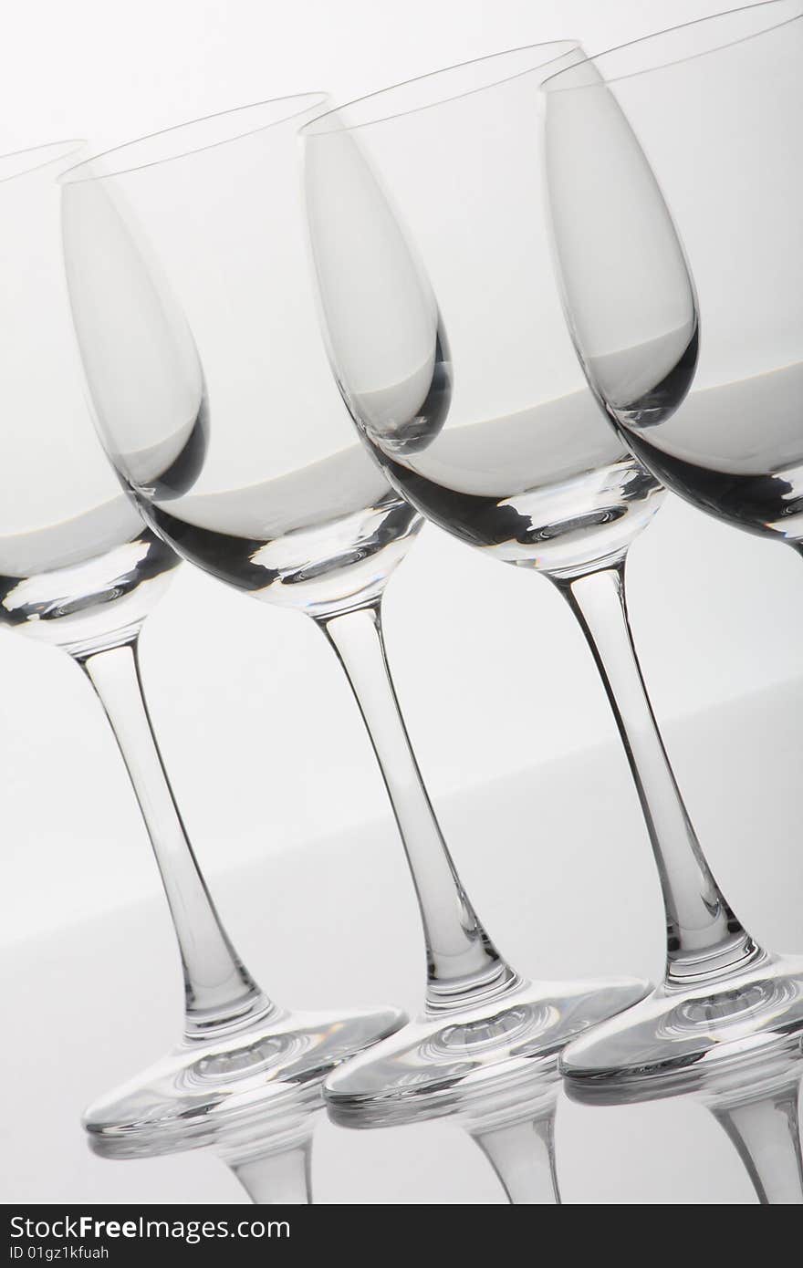 Empty wine glasses with reflections