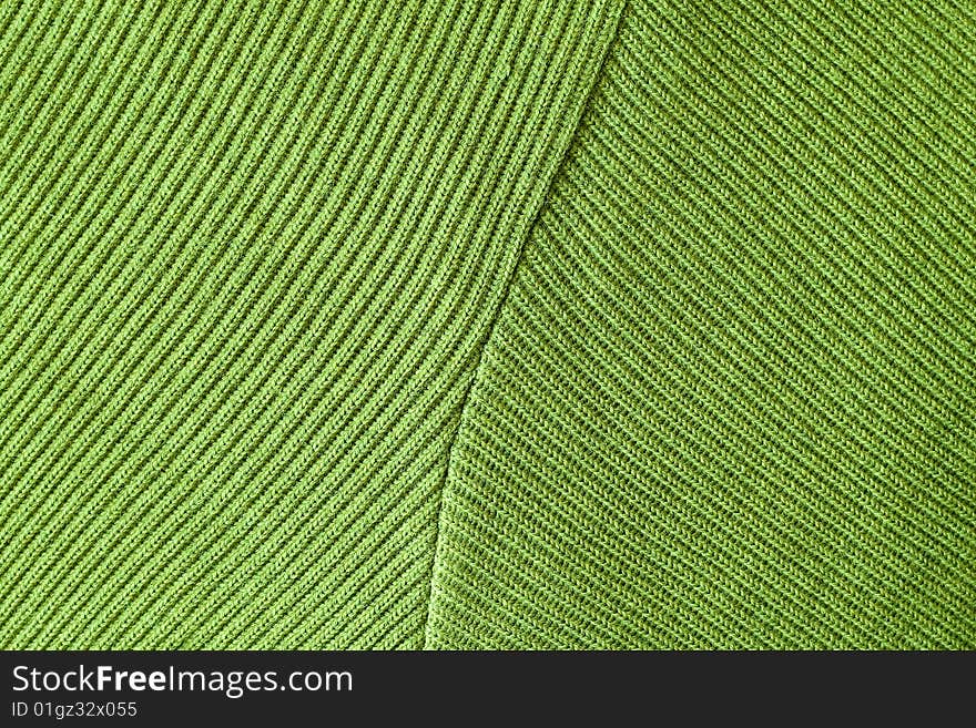 Green fabric with embroidery and decorations. Green fabric with embroidery and decorations