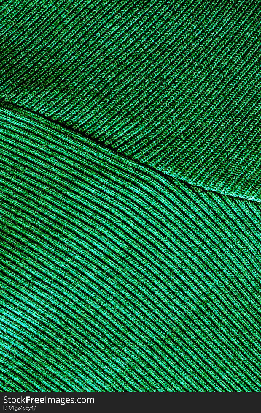 Green fabric with embroidery and decorations. Green fabric with embroidery and decorations