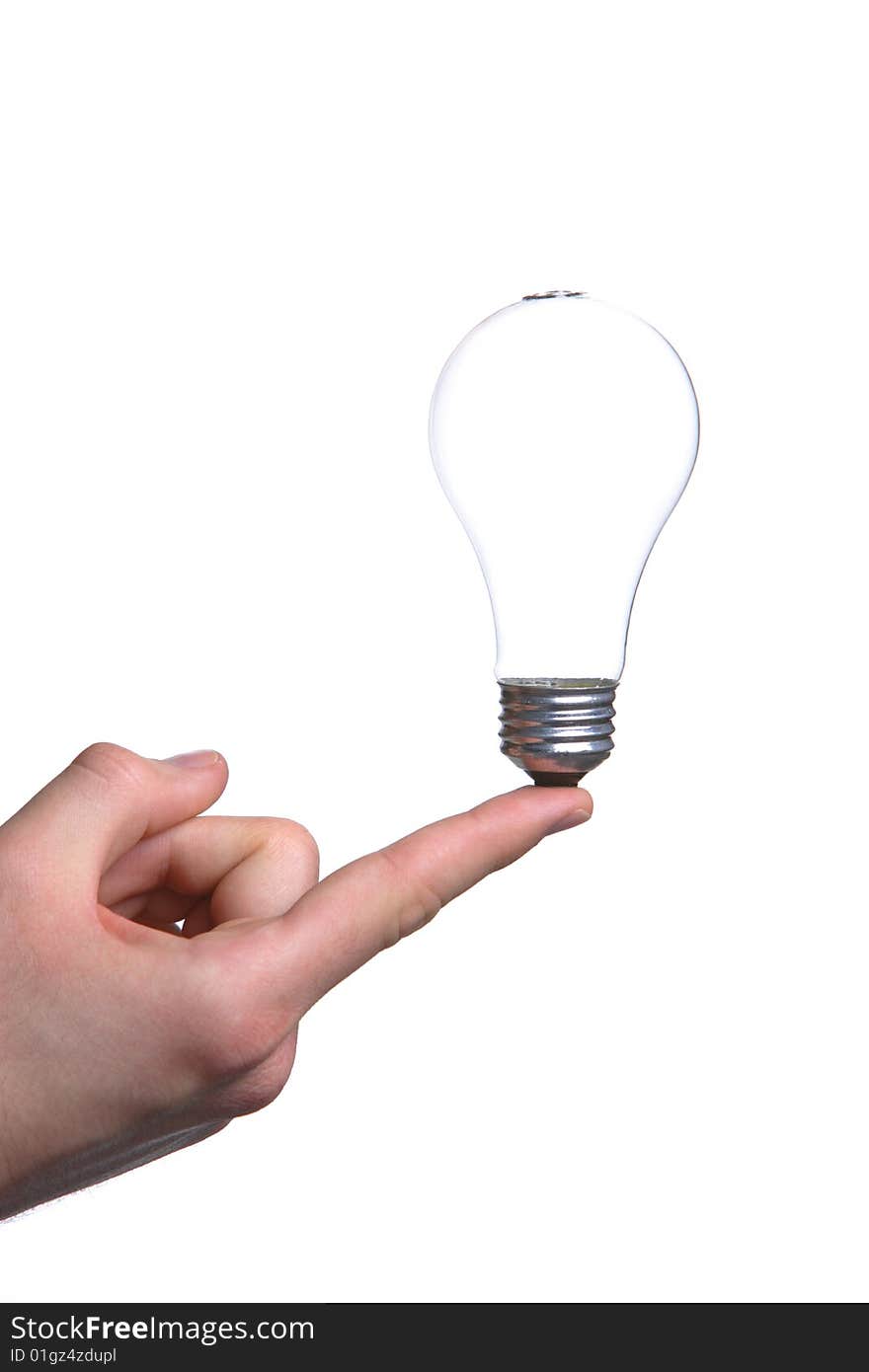 Person holding a green light bulb isolated on white