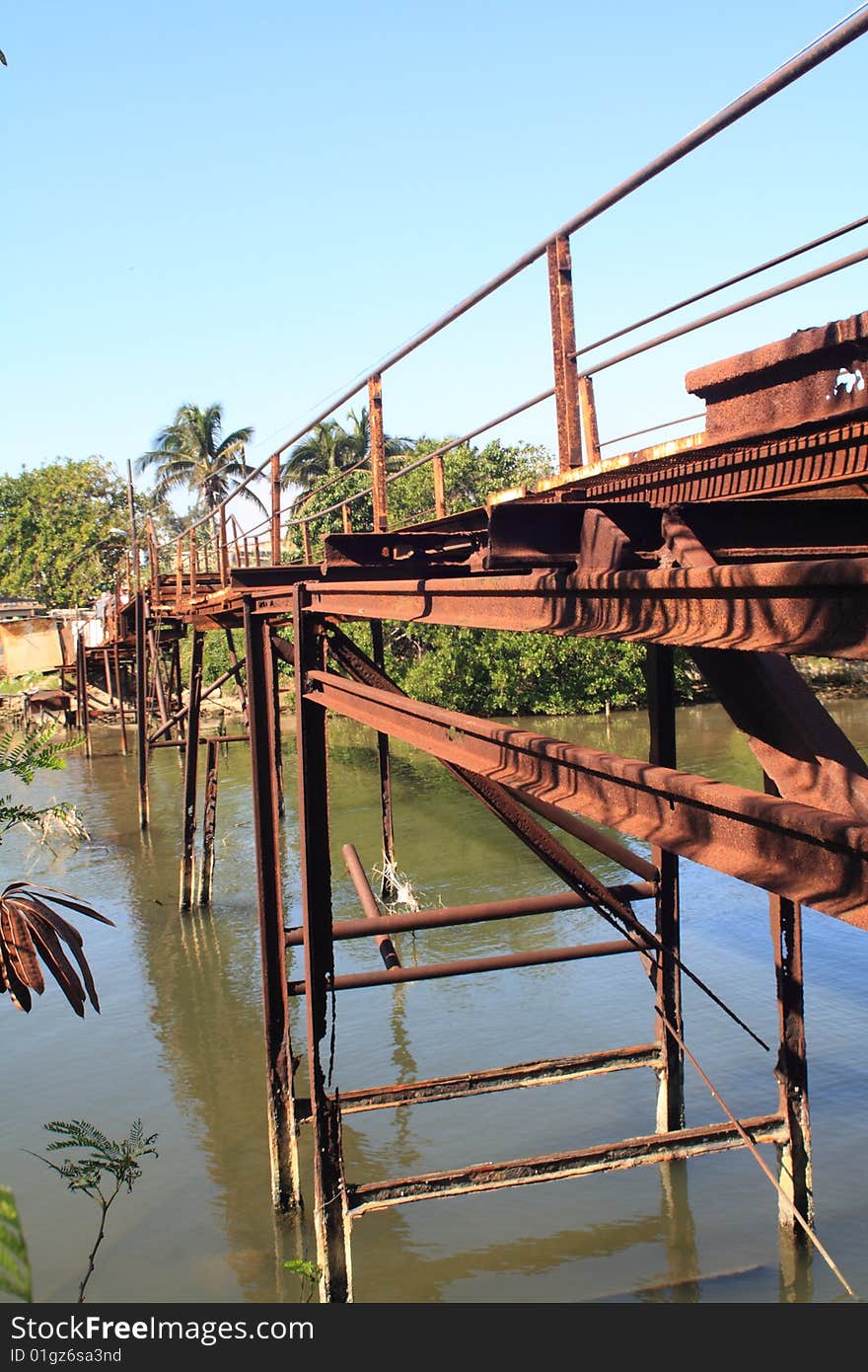 Old rusty iron bridge, vertical view