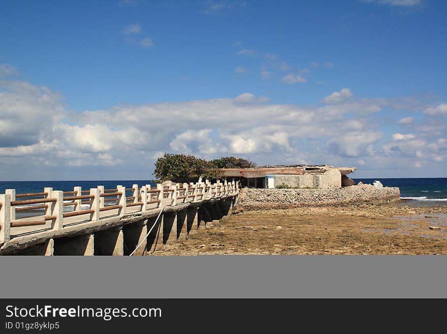 Abandoned club in a rocky seashore, in a summer day