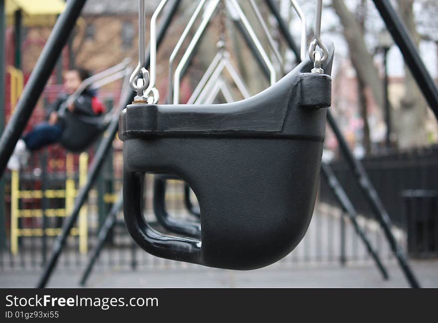 Close up of baby playground swings