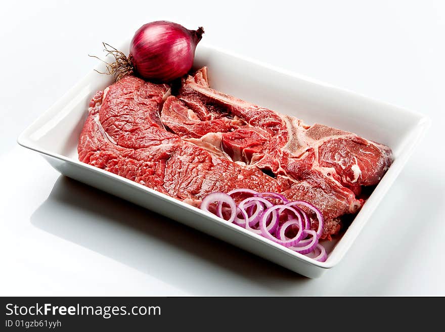 Raw beef cut kown as striploin or cote de boeuf