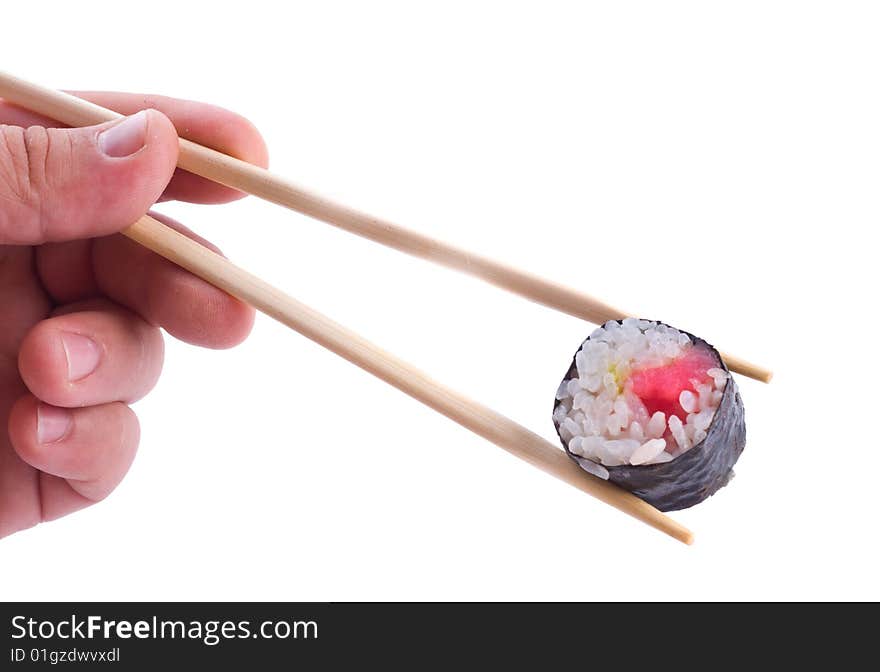 Sushi with chopsticks shot on white