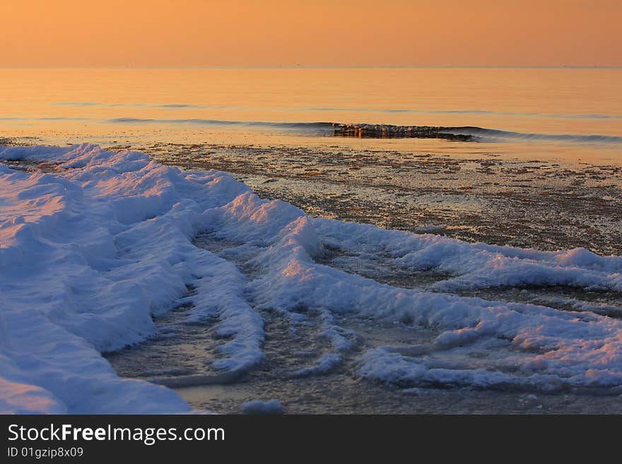 Serene sunset on the sea shore