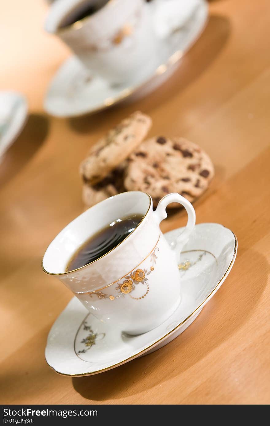 Cup of coffee and chocolate cookies