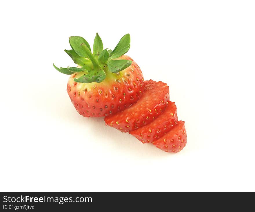 Sliced strawberry on white isolated background. Sliced strawberry on white isolated background.