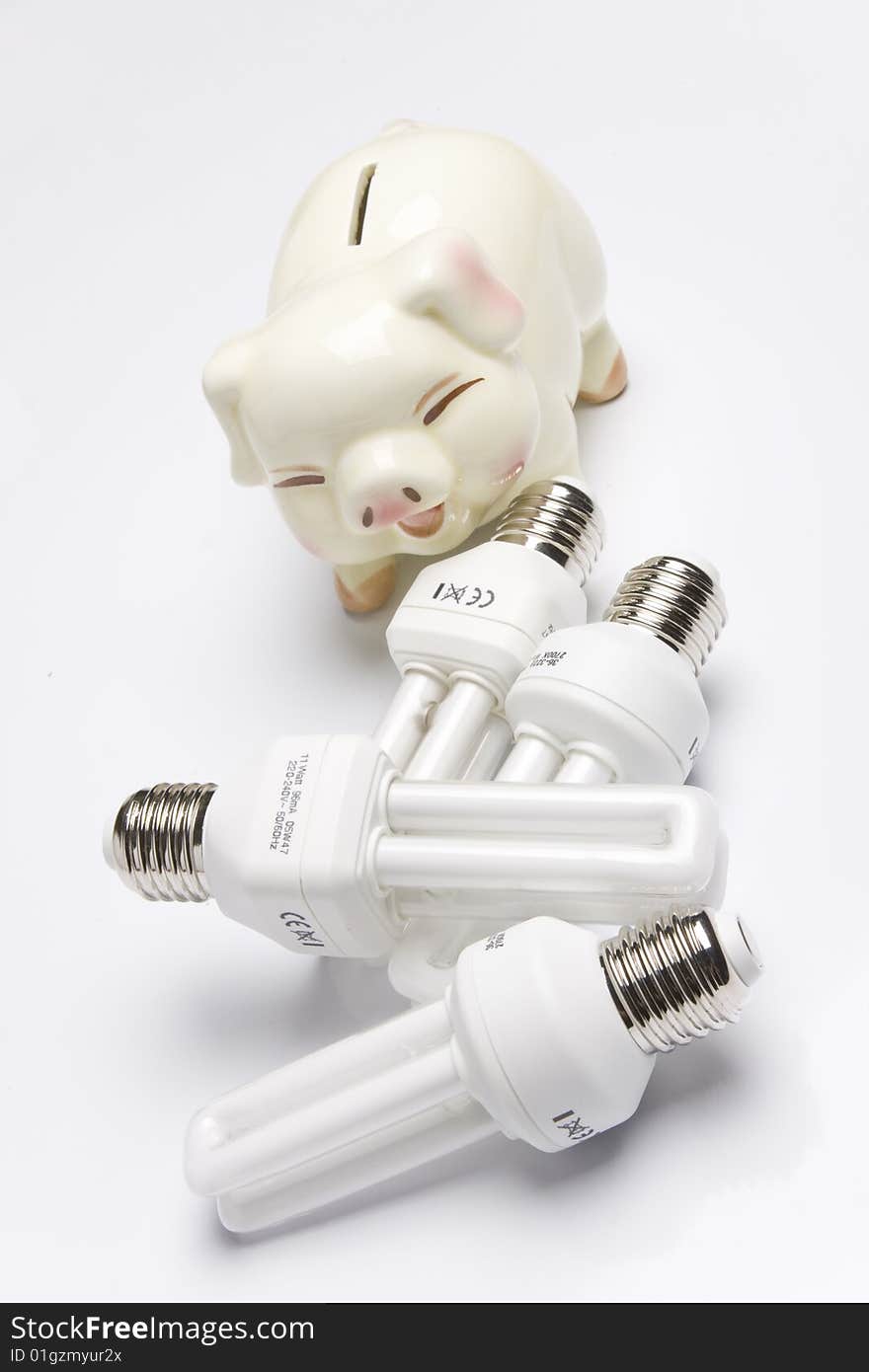 Piggy bank with fluorescent light bulb (smart energy).