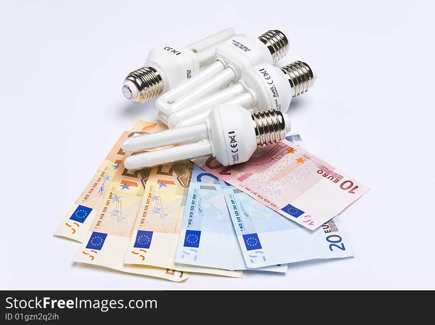 Fluorescent light bulb with money