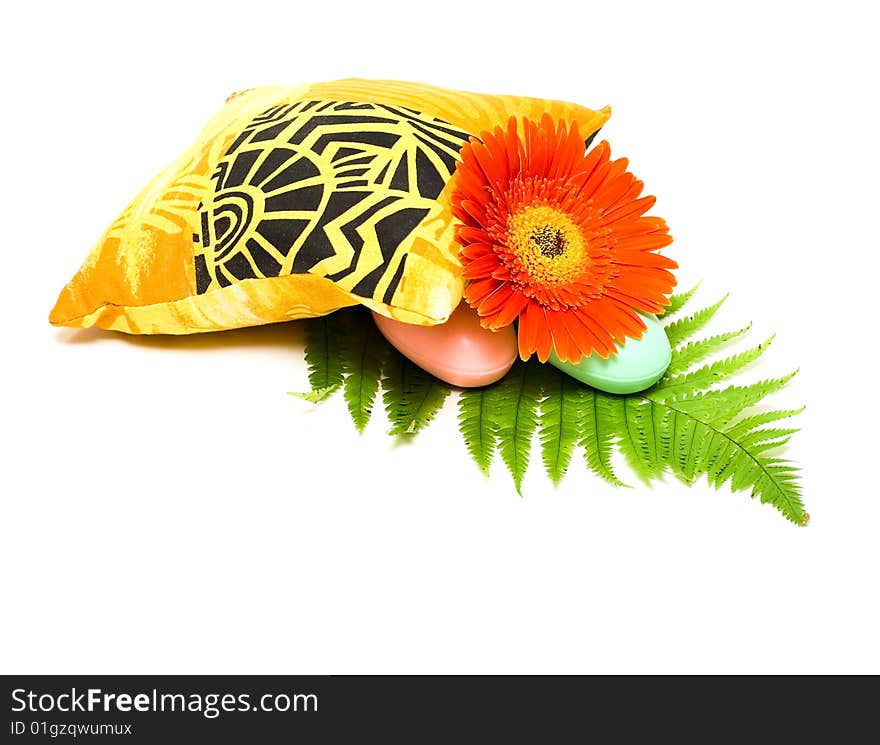 Soap and flower isolated on white