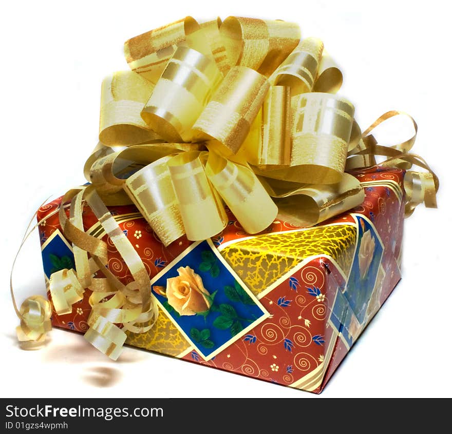 Beautiful gift with golden ribbon