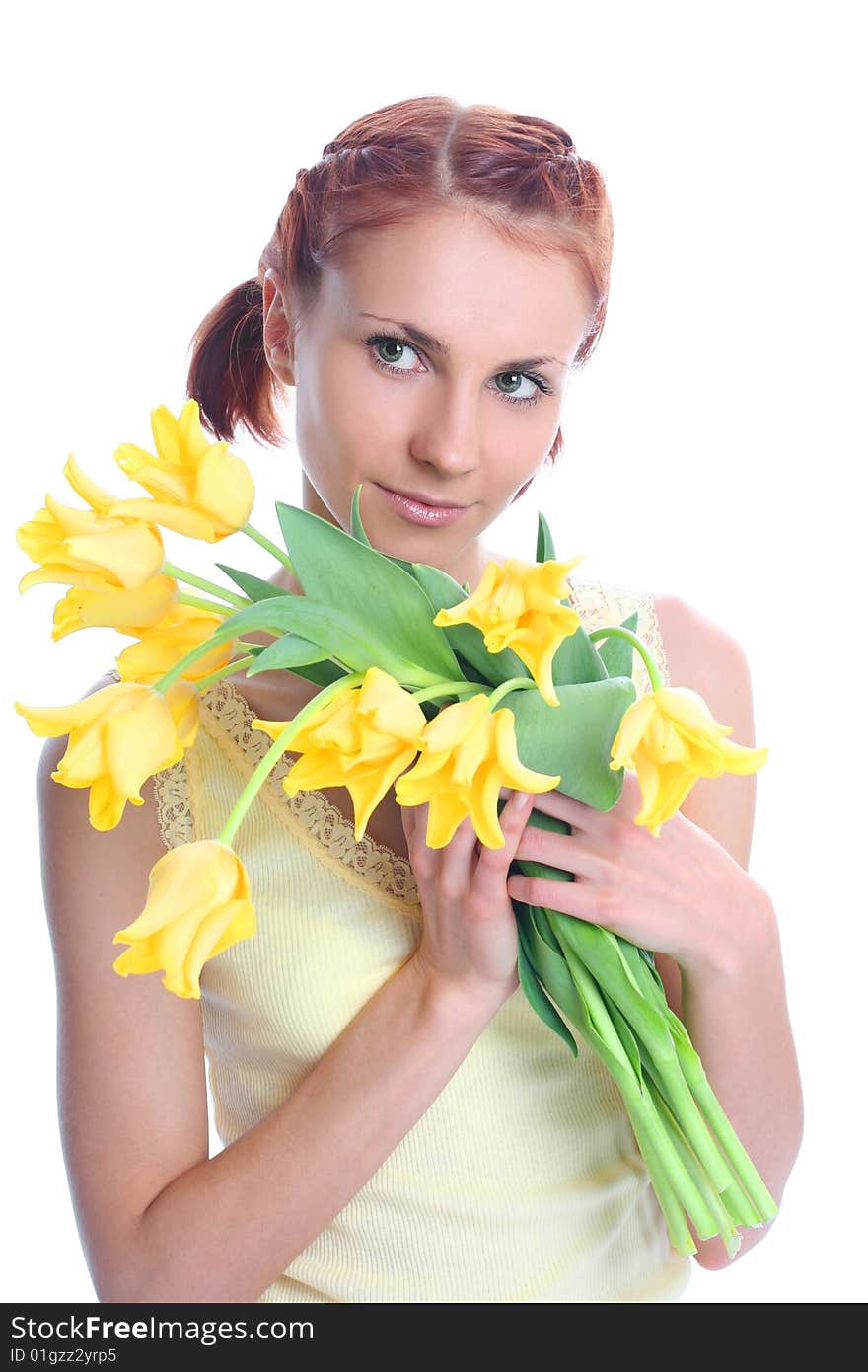 Cute young woman with yellow tulips. Cute young woman with yellow tulips