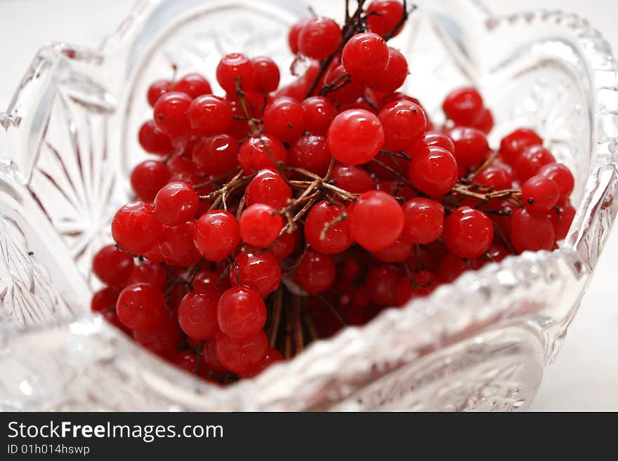 Berries in a crystal vase. Close-up. Berries in a crystal vase. Close-up.