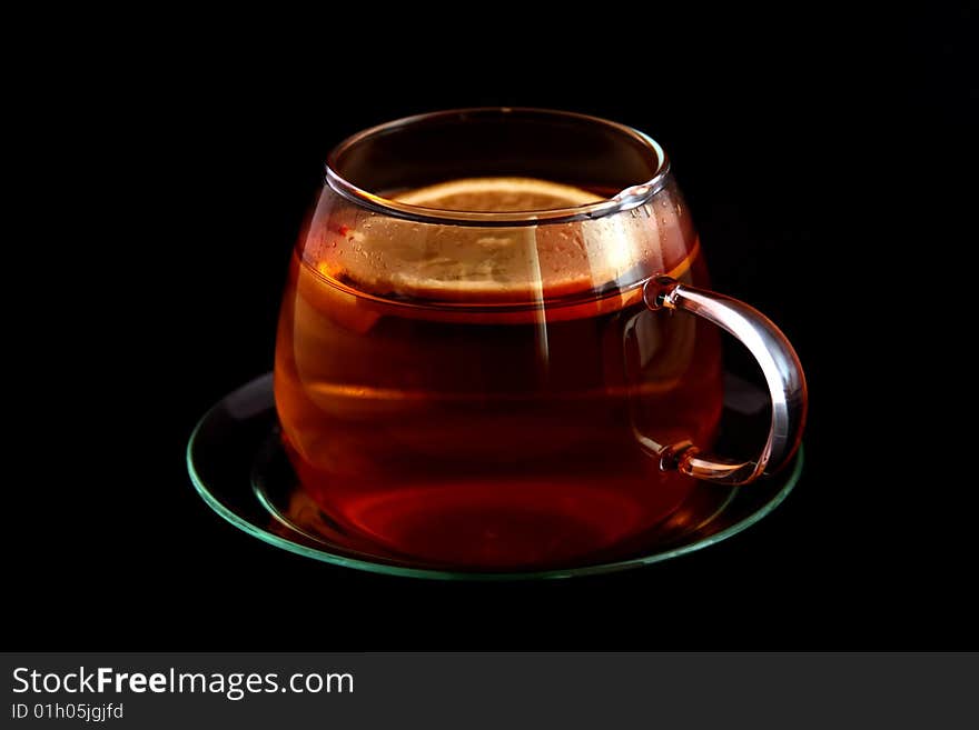 Cup of tea black background