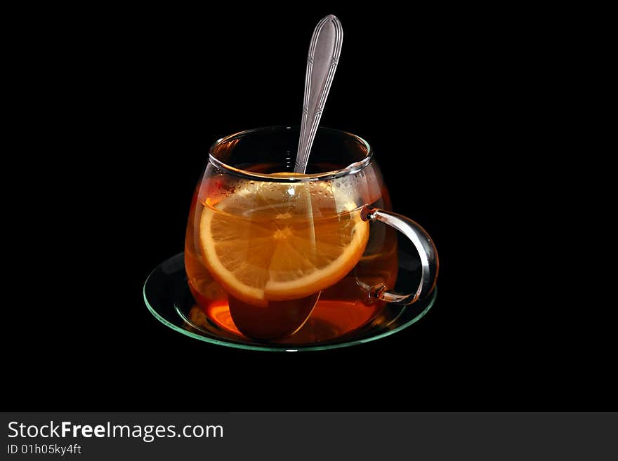 Cup of tea black background