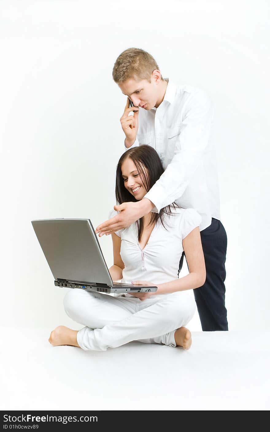 Young students with notebook, man woman explains something. Young students with notebook, man woman explains something