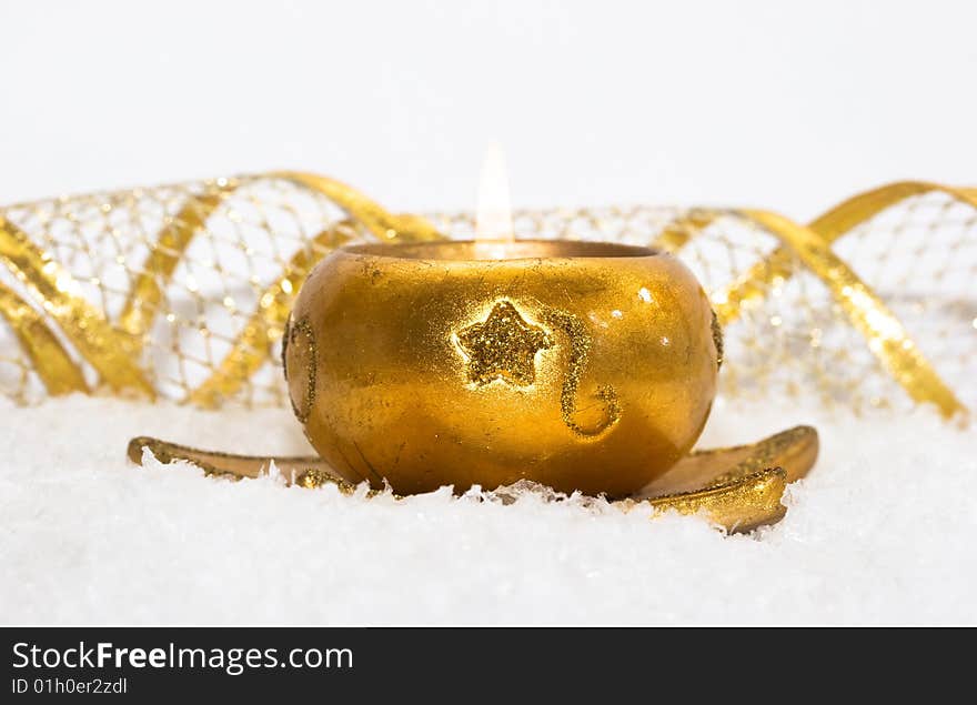 Festive new-year candle with snow