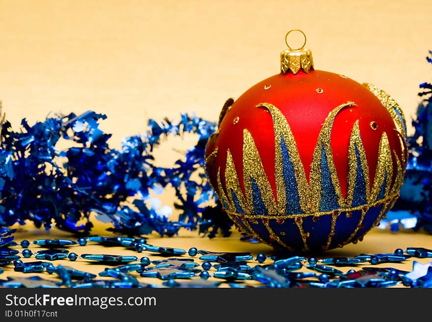 Red Christmas ball with blue decoration