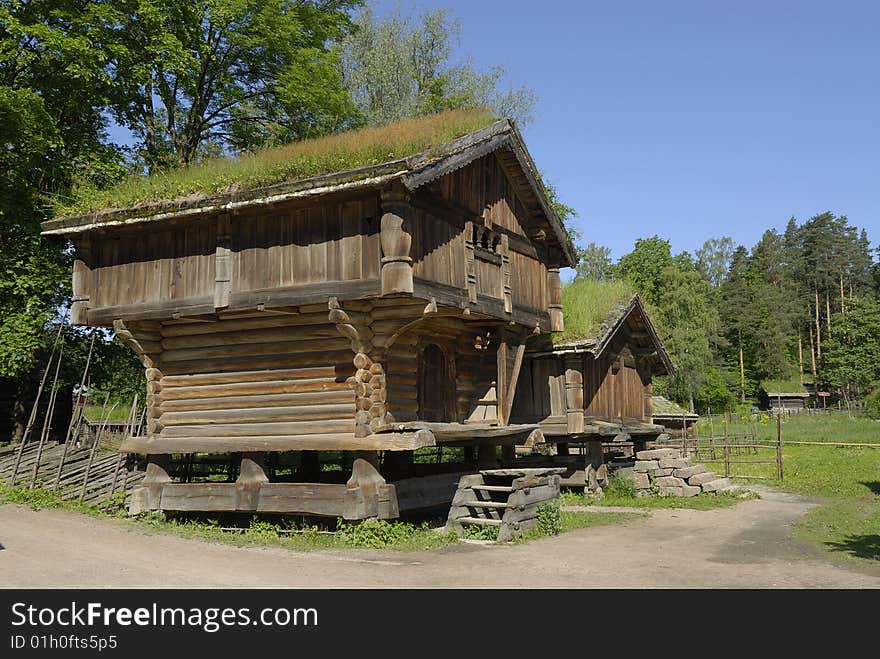 Wooden cottages in a park