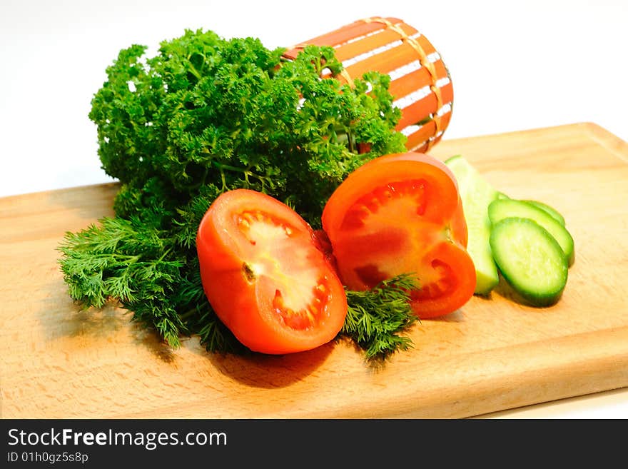 Tomatoes, cucumbers, parsley, salad, kitchen. Tomatoes, cucumbers, parsley, salad, kitchen