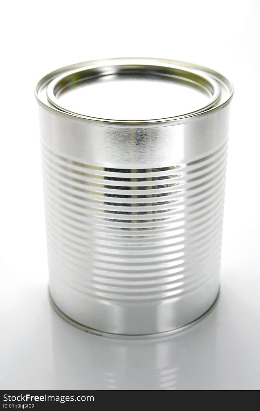 Tin canisters isolated against a white background