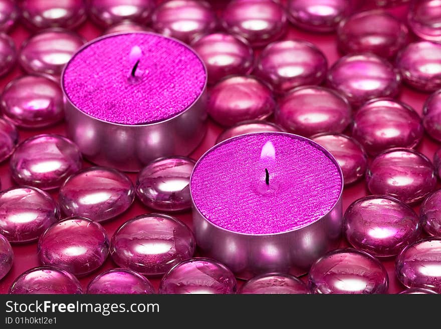 Pink candles with decoration balls