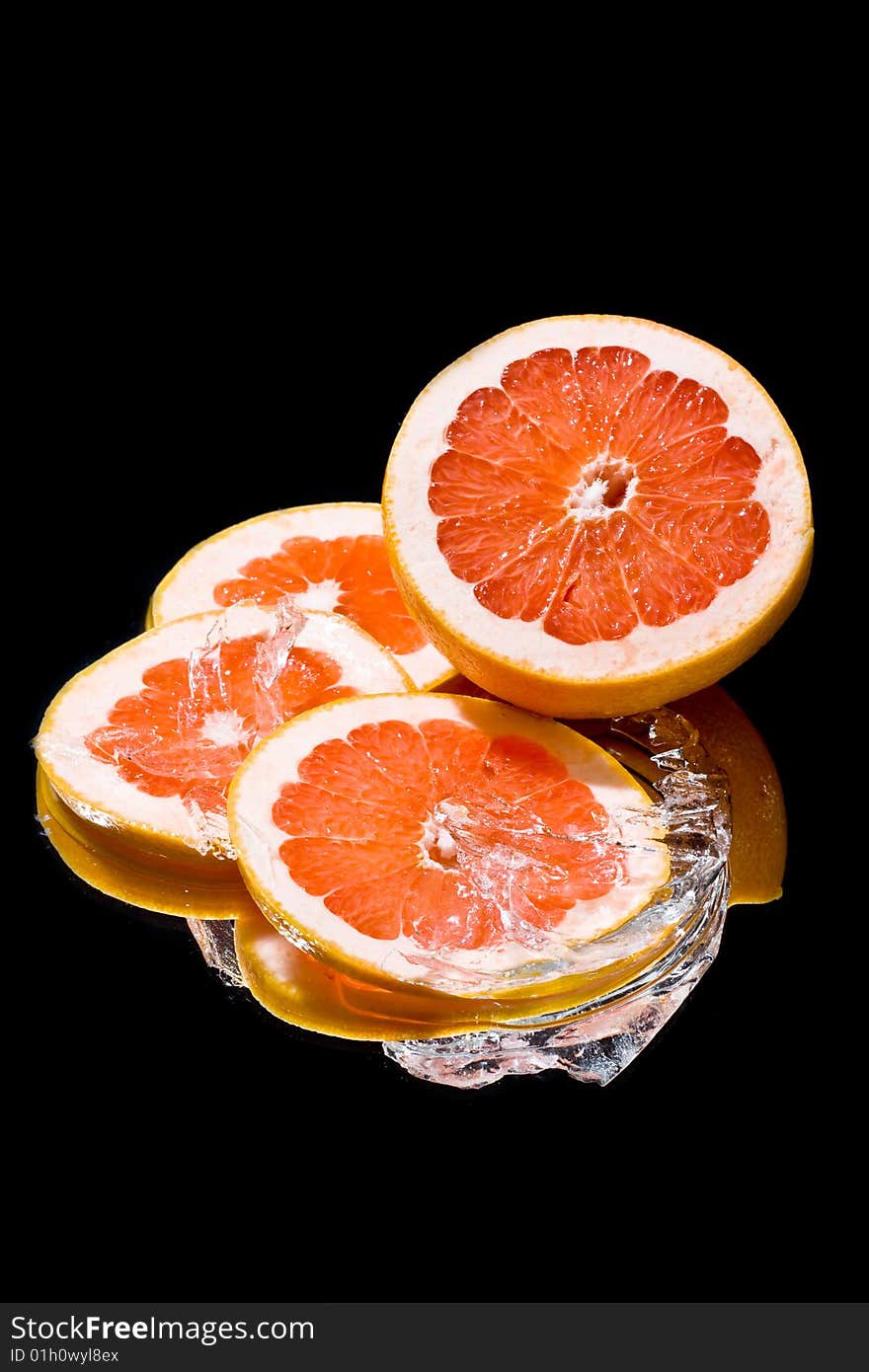 Still life  with ice and grapefruit