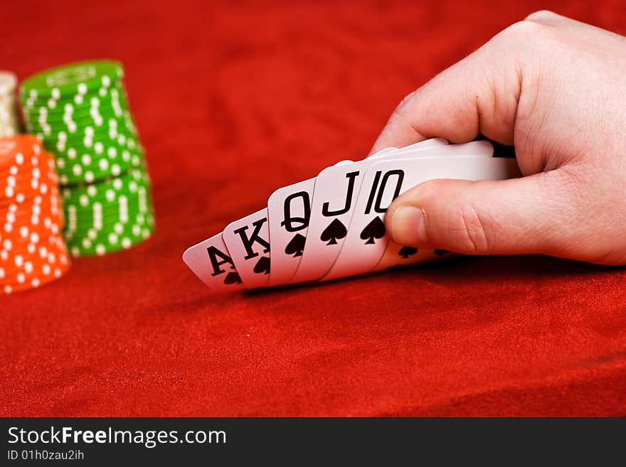 Hand keeping row of cards