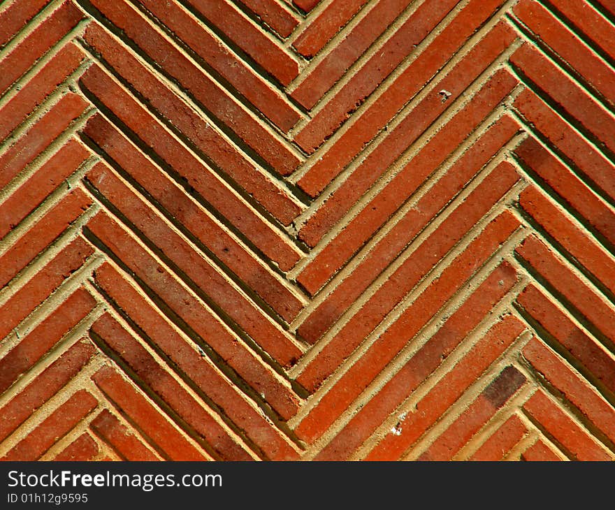 Red wall with a perpendicular pattern texture.