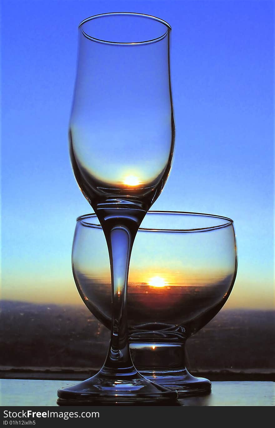 Glasses against the backdrop of sunset