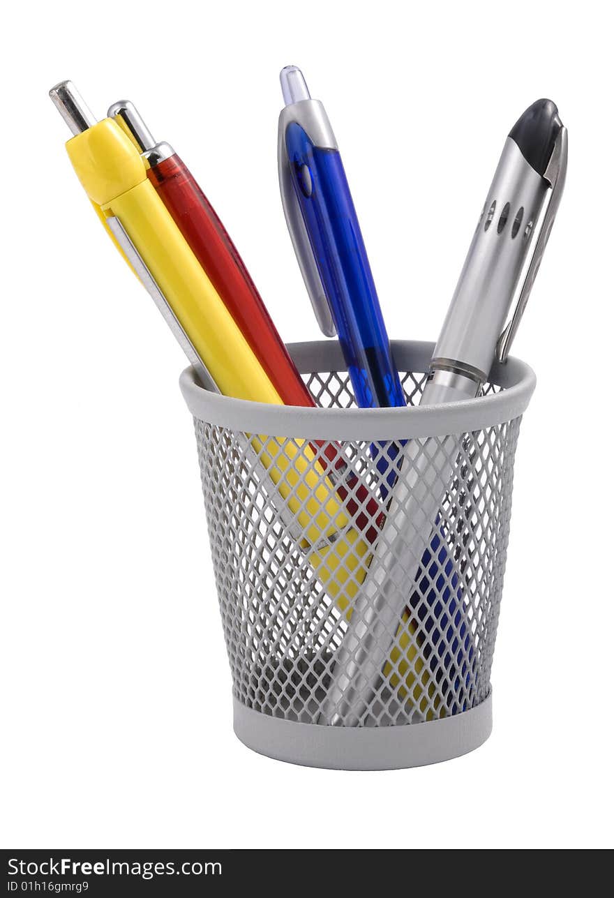 Colored pens in a metal glass, isolated on white background.