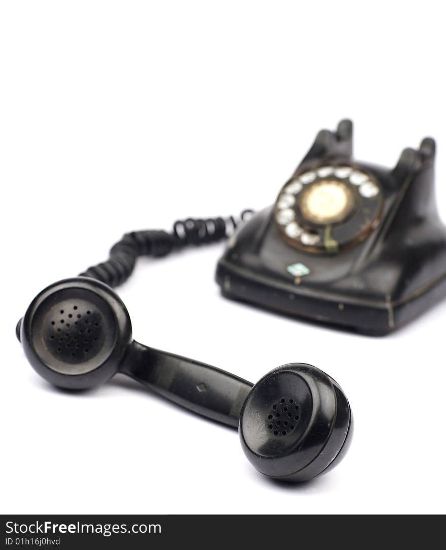 Old telephone in white background. Old telephone in white background