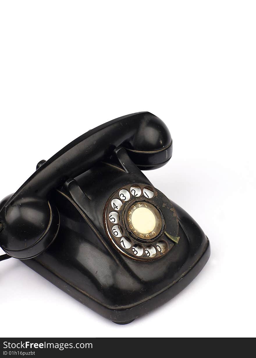 Old telephone in white background. Old telephone in white background