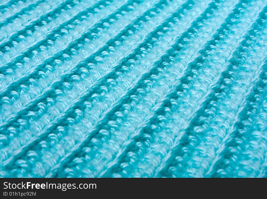 Blue knitted wool texture background