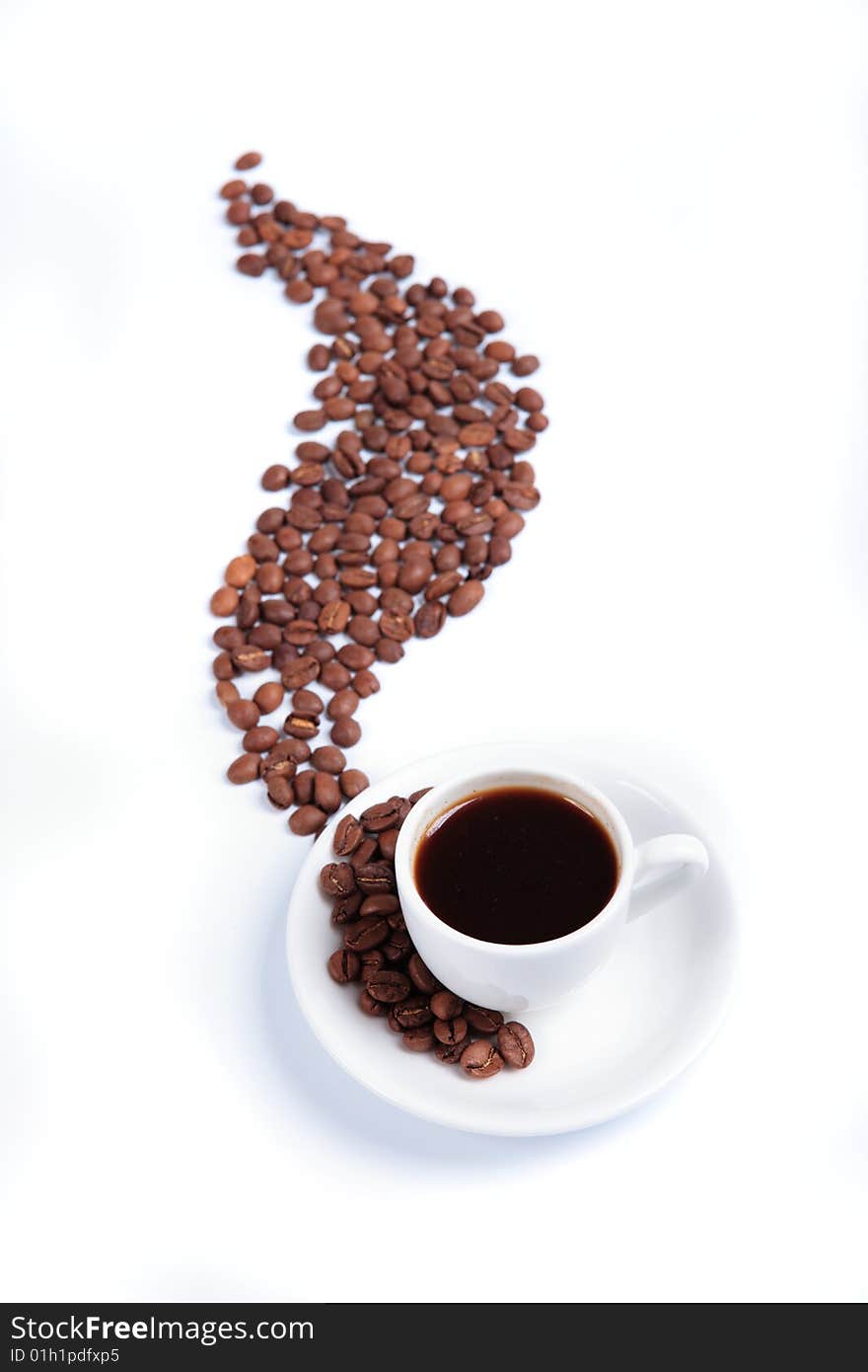 White cup with fragrant coffees and coffee beans