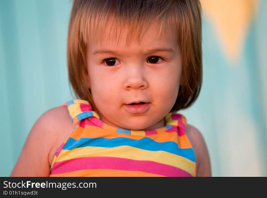 A baby-girl playing on a beach down-under. A baby-girl playing on a beach down-under