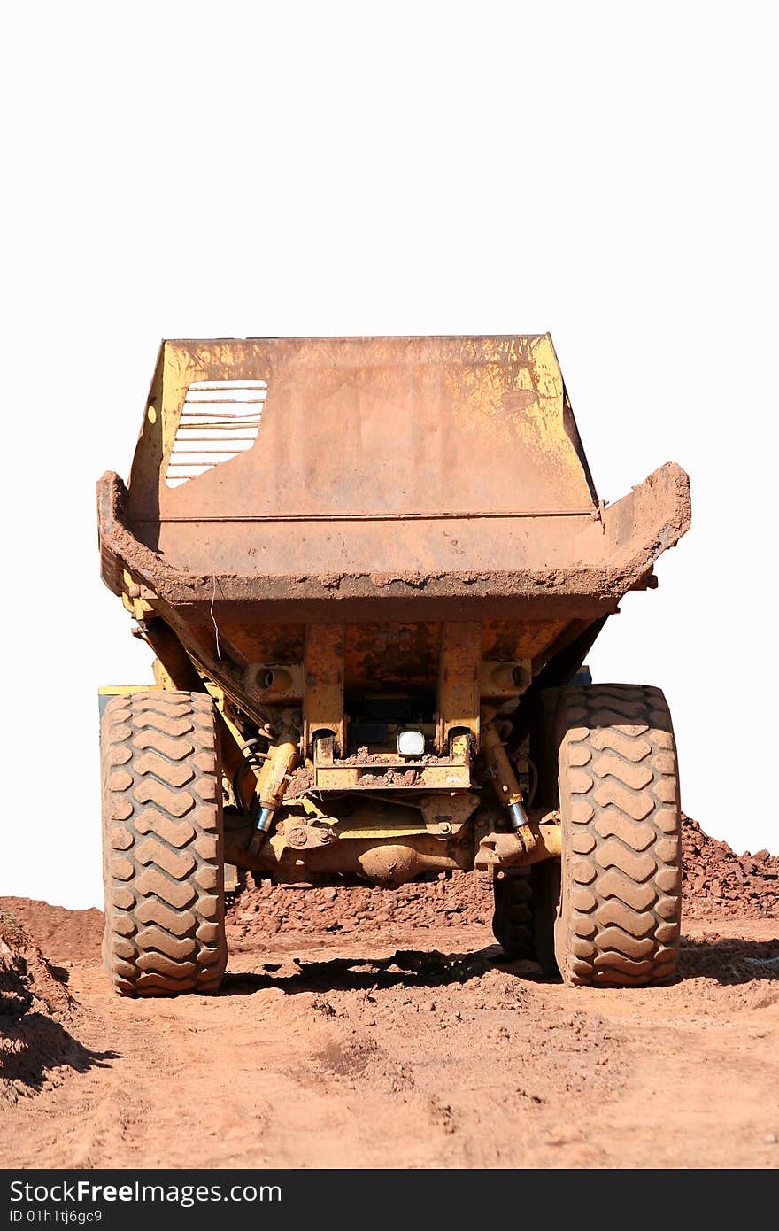 A rearview of a large dumptruck. A rearview of a large dumptruck