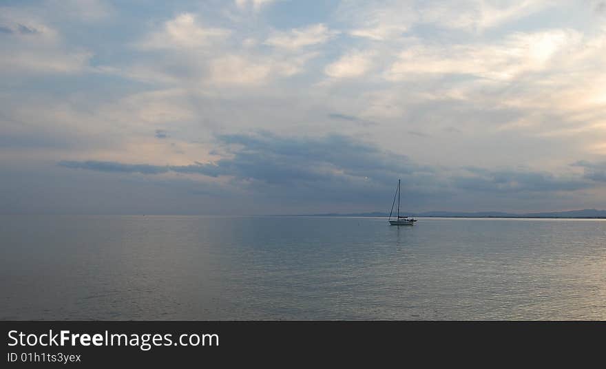 Yacht by the sea. Evening