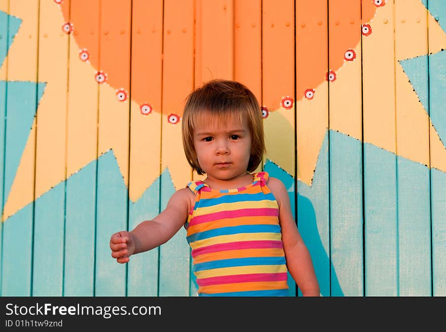 A baby-girl playing on a beach down-under. A baby-girl playing on a beach down-under