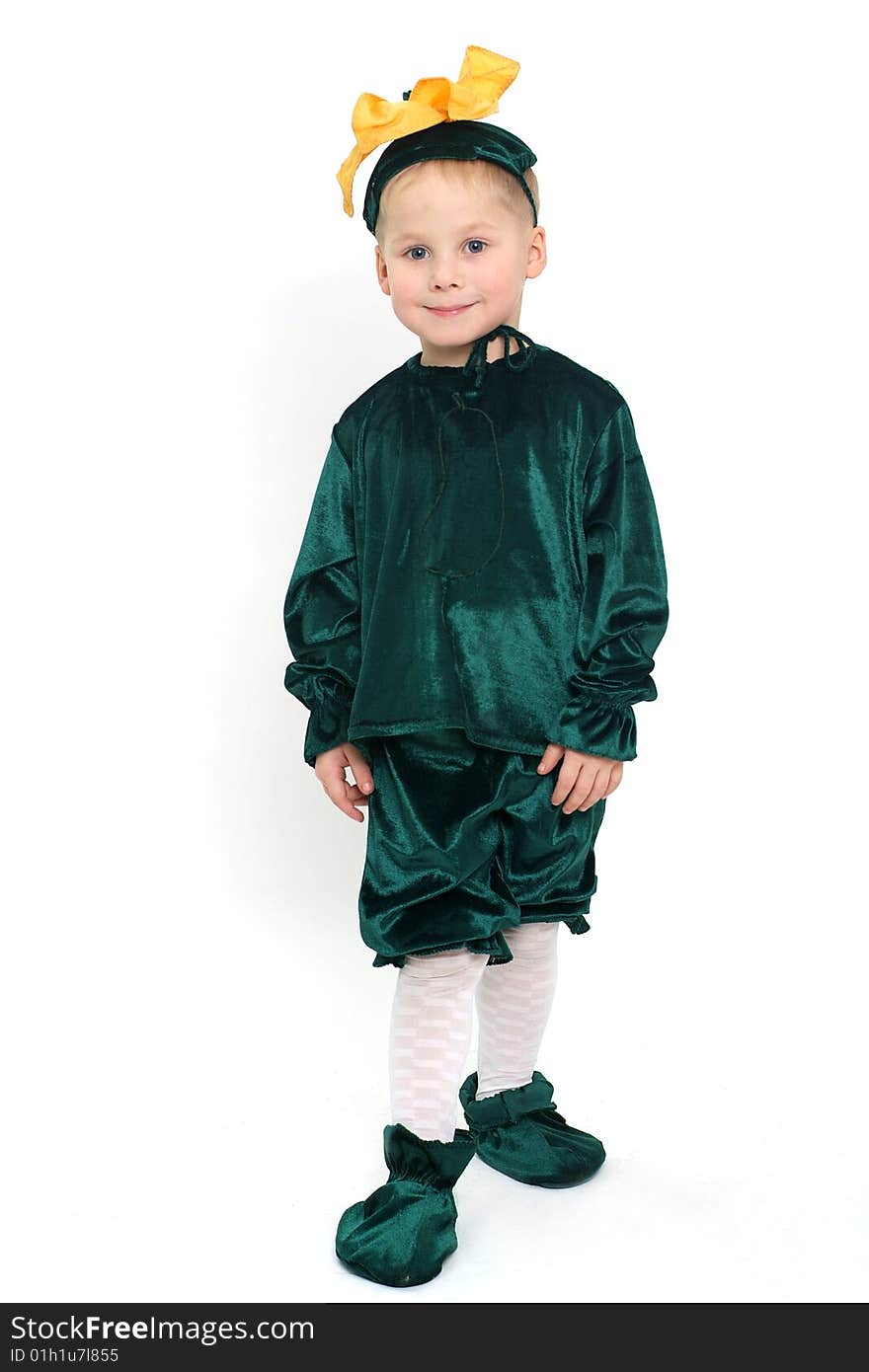 Little cute boy in green costume studio shot. Little cute boy in green costume studio shot